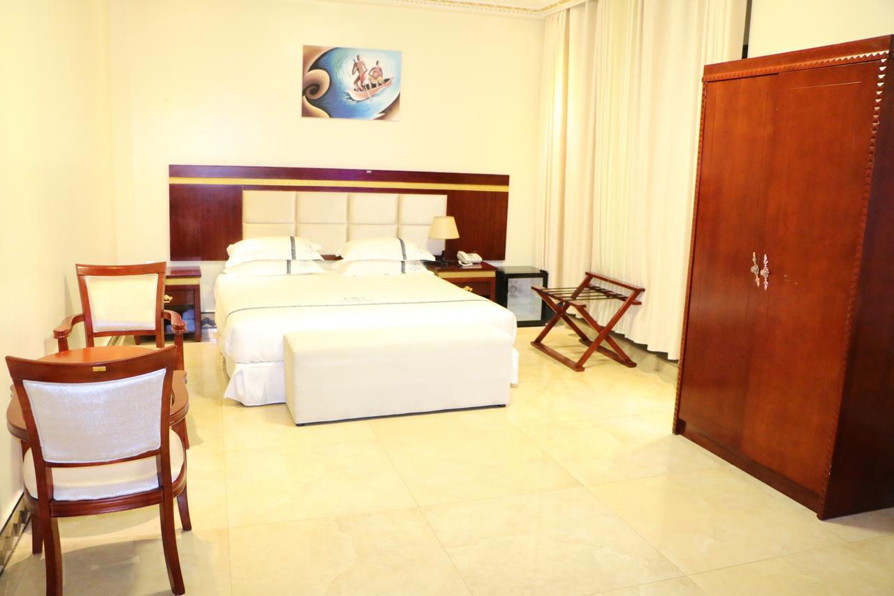 Dove Hotel Кигали Экстерьер фото