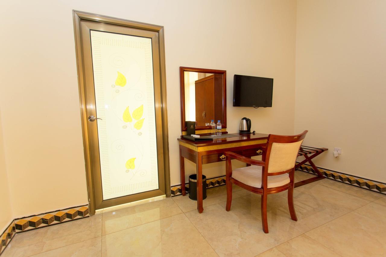 Dove Hotel Кигали Экстерьер фото