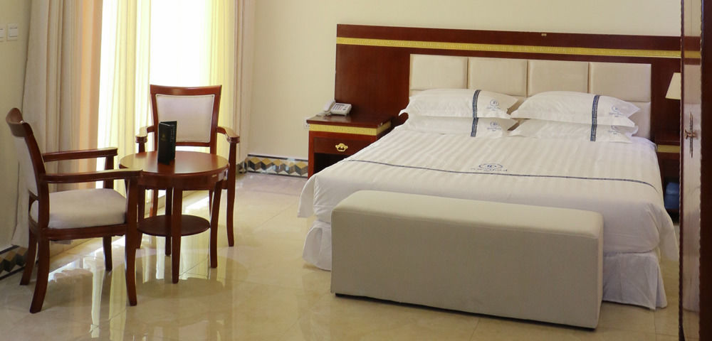 Dove Hotel Кигали Экстерьер фото