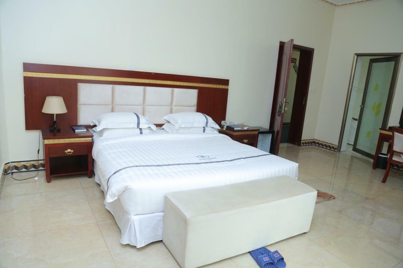 Dove Hotel Кигали Экстерьер фото