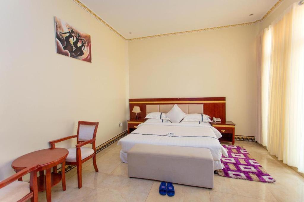 Dove Hotel Кигали Экстерьер фото